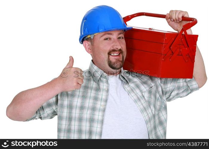 Tradesman carrying a toolbox