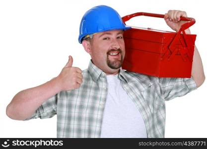 Tradesman carrying a toolbox