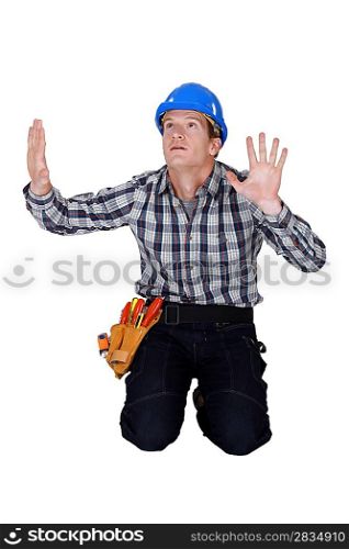 Tradesman confined by a glass wall