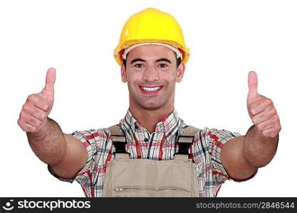 Tradesman giving two thumb&acute;s up