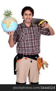 Tradesman holding a globe and saw