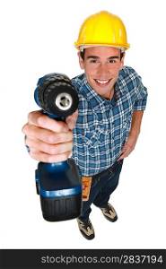 Tradesman holding a power tool