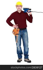 Tradesman holding a sander