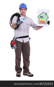 Tradesman holding a wad of money and an energy efficiency rating sign