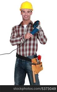 Tradesman holding an angle grinder