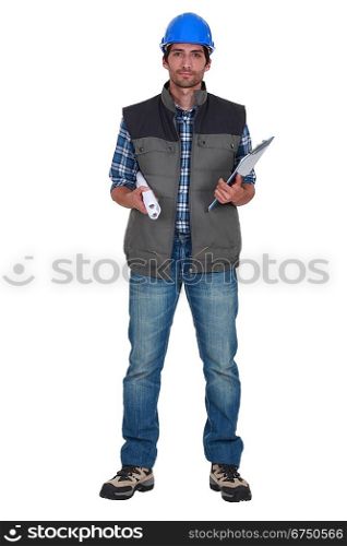 Tradesman holding rolled-up blueprints and a clipboard