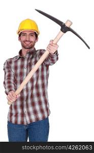Tradesman holding up a pickaxe