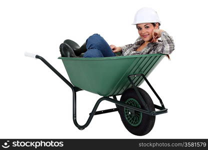 Tradesman in a wheelbarrow