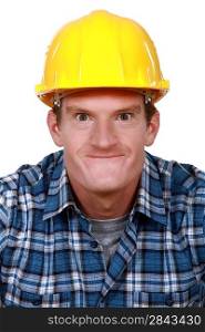 Tradesman making a silly face
