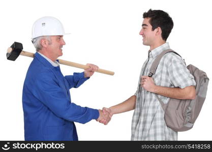 Tradesman meeting new apprentice