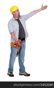 Tradesman presenting an invisible object