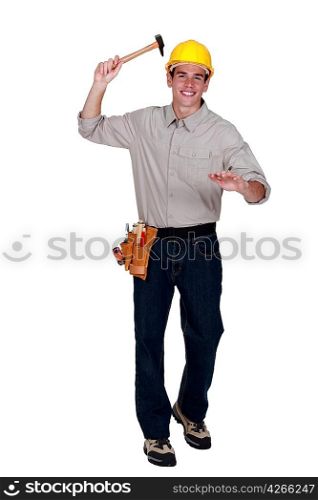 Tradesman raising a hammer