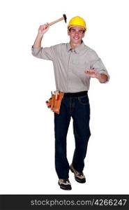Tradesman raising a hammer
