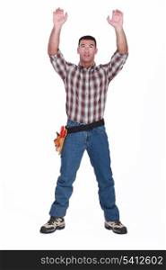 Tradesman reaching for an object
