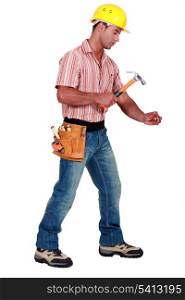 Tradesman using a hammer
