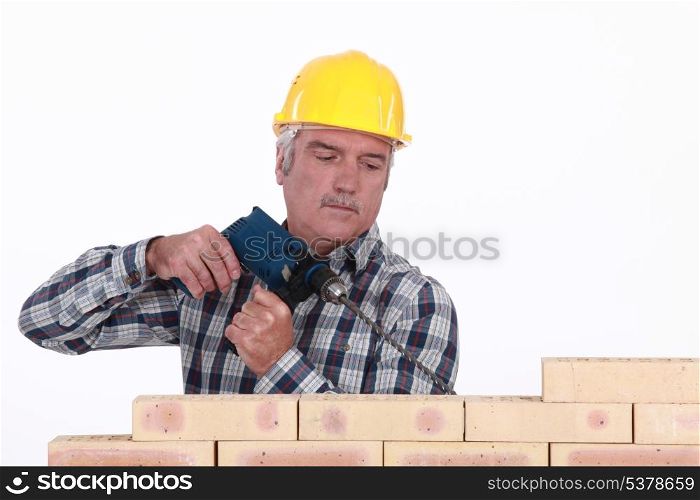 Tradesman using a screwdriver