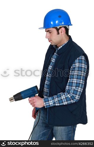 Tradesman with a heatgun