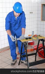 Tradesman working in a workshop