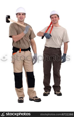 Tradesmen holding their tools