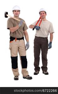 Tradesmen holding their tools