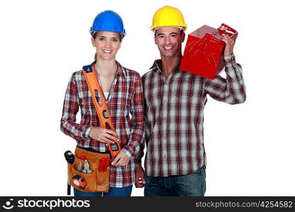 Tradespeople posing with their tools
