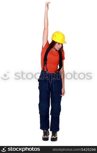 Tradeswoman being pulled up