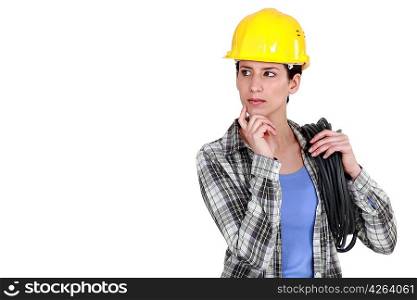 Tradeswoman deep in thought