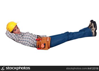 Tradeswoman floating in the air