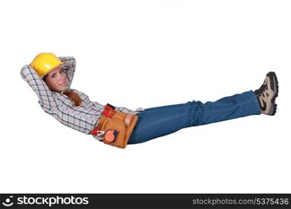 Tradeswoman floating in the air
