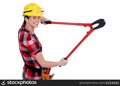 Tradeswoman holding a large set of clippers