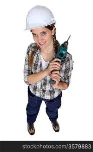 Tradeswoman holding a power tool