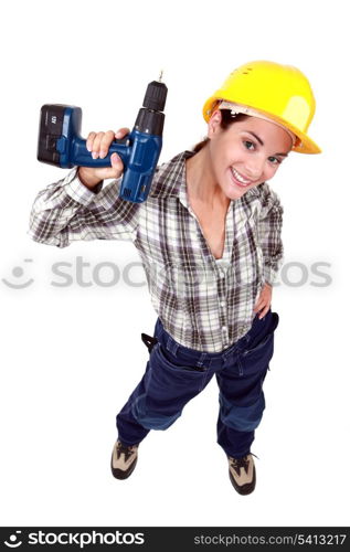 Tradeswoman holding a power tool