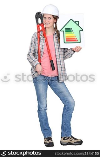 Tradeswoman holding oversized pliers