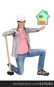 Tradeswoman holding up rating chart