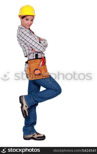 Tradeswoman leaning against an invisible wall