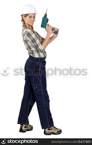 Tradeswoman with electric screwdriver