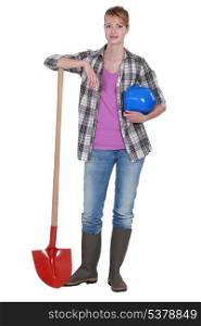 Tradeswoman with her shovel