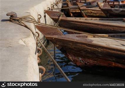 Traditional Abra boats in Dubai. Traditional Abra boat at the pier in Dubai