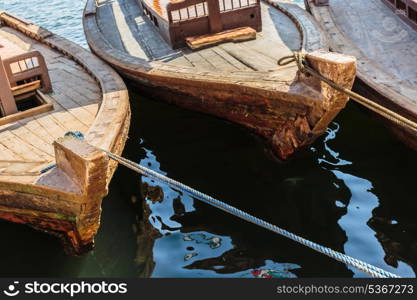 Traditional Abra boats in Dubai. Traditional Abra boat at the pier in Dubai