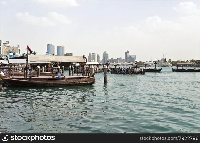 Traditional Abra (water taxi) crossing the Dubai Creek between Deira and Bur Dubai
