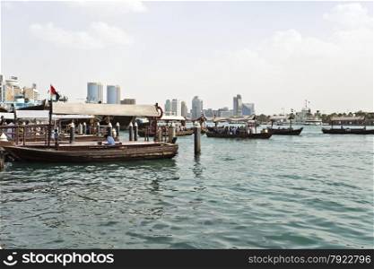 Traditional Abra (water taxi) crossing the Dubai Creek between Deira and Bur Dubai