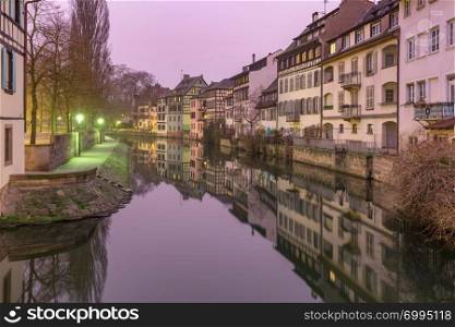 Traditional Alsatian half-timbered houses with mirror reflections, Petite France in the morning, Strasbourg, Alsace, France. Petite France in the morning, Strasbourg, Alsace