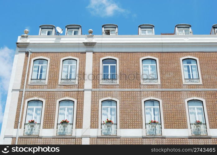 traditional and classic residential building (flowers in balcony)