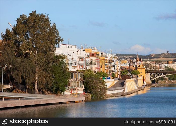 Traditional apartment houses of Triana District by the Guadalquivir river in the city of Seville, Andalusia, Spain.