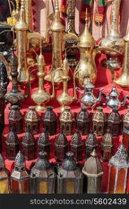 Traditional Arabic metal lights and kettles on the market