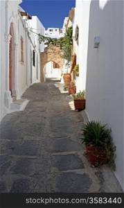 Traditional architecture in the streets and backalleys of Lindos in Rhodes Greece
