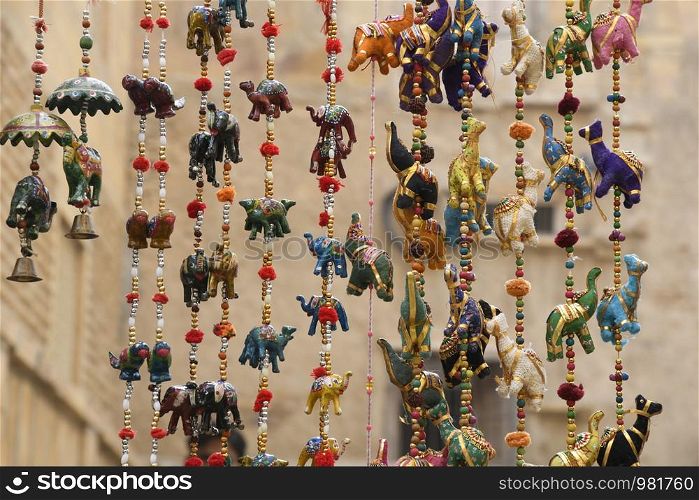 Traditional art and craft hangings near Kothari's Patwon ki Haveli at Jaisalmer in Rajasthan, India. Traditional art and craft hangings near Kothari's Patwon ki Haveli, Jaisalmer, Rajasthan, India