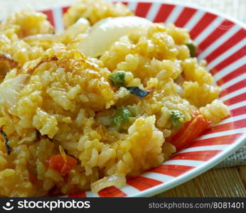 Traditional Bahraini Muhammar sweet rice dish seasoned with spices and date palm molasses