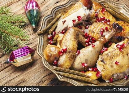 Traditional baked chicken stuffed with apples for Christmas.Christmas turkey. Traditional christmas chicken