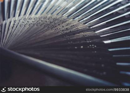 Traditional black hand fand closeup view. Abstract background. Traditional hand fand closeup view